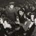 16. Audience receiving question cards at a health education meeting, New Victoria Cinema, 1947