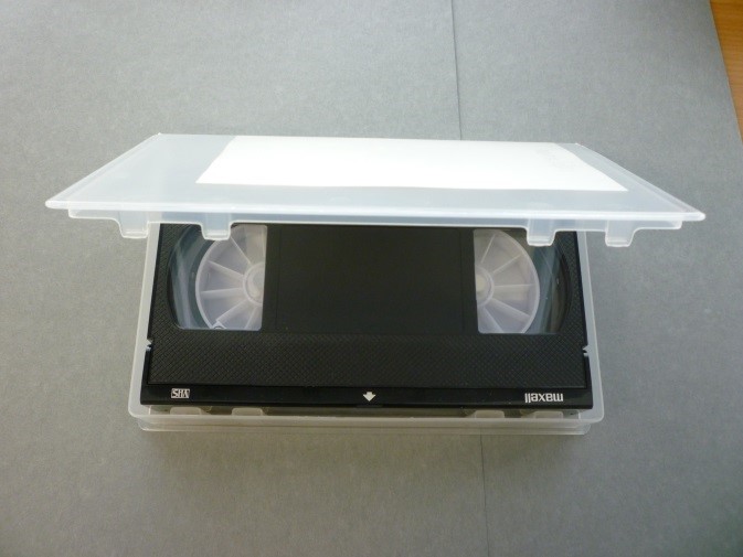 VHS cassette, after rehousing in polypropylene case.