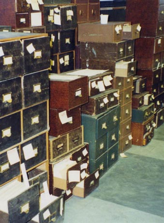 Patient index cards in original drawers, before re-housing.